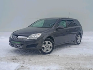 Opel Astra 2011 г. (серый)